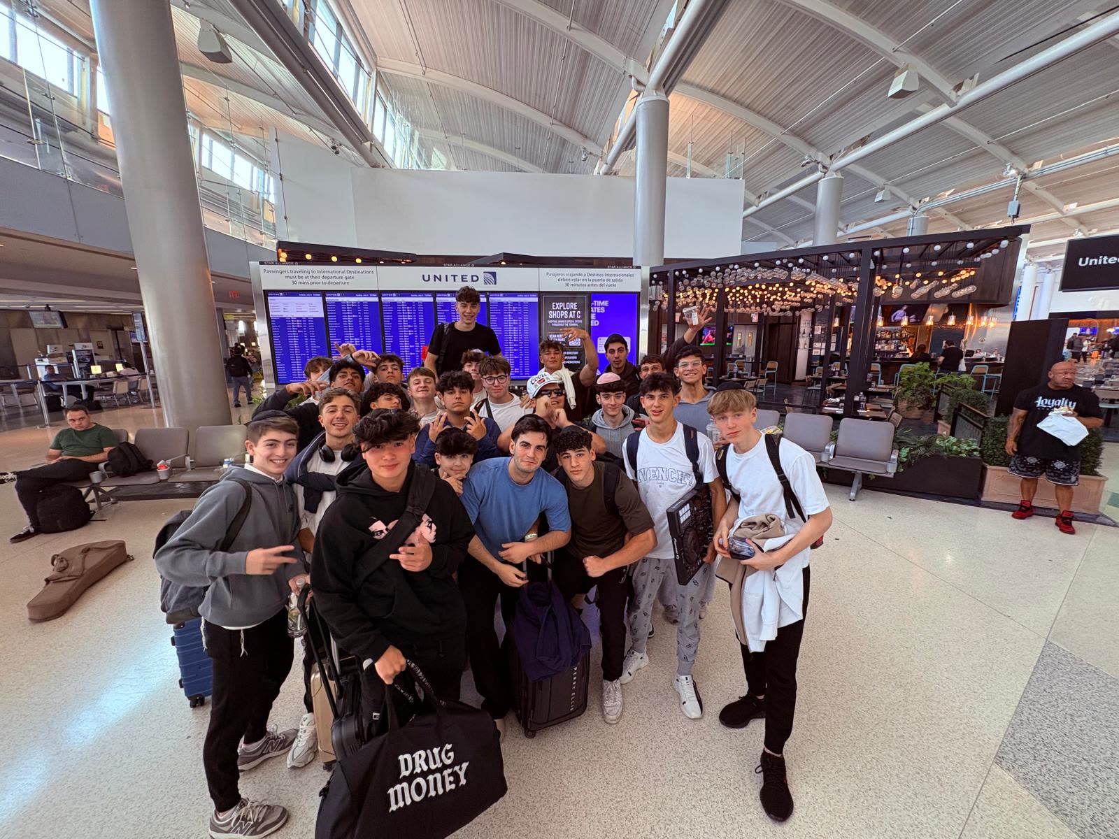 Group photo at the airport terminal